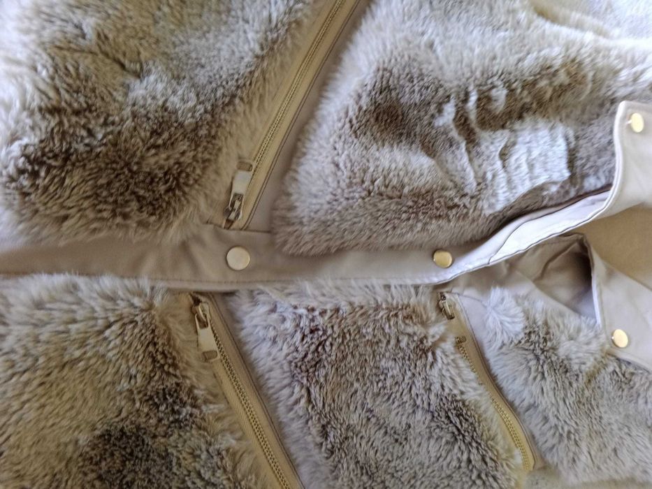 Colete You e Me Paris, muito bem cuidado.