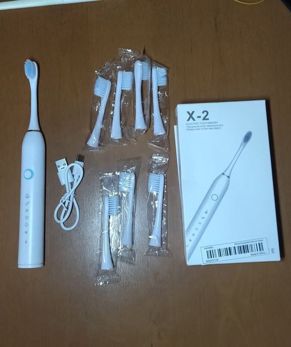 Зубна електрощітка X-2.