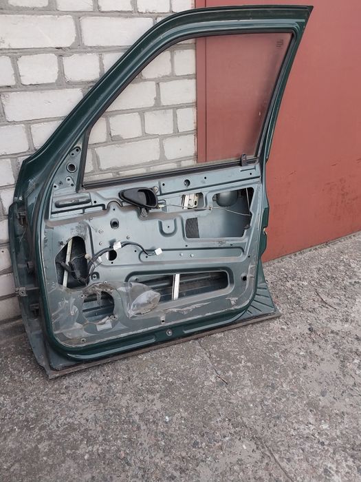 Двері нива шевроле передні і задні 2123