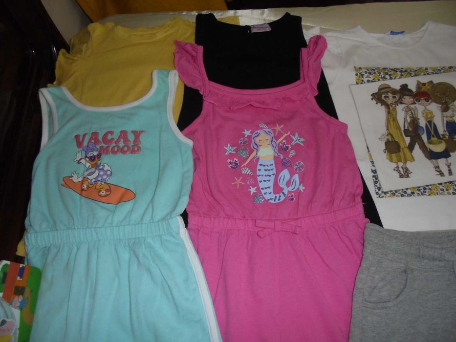 lote de roupa de menina a contorção