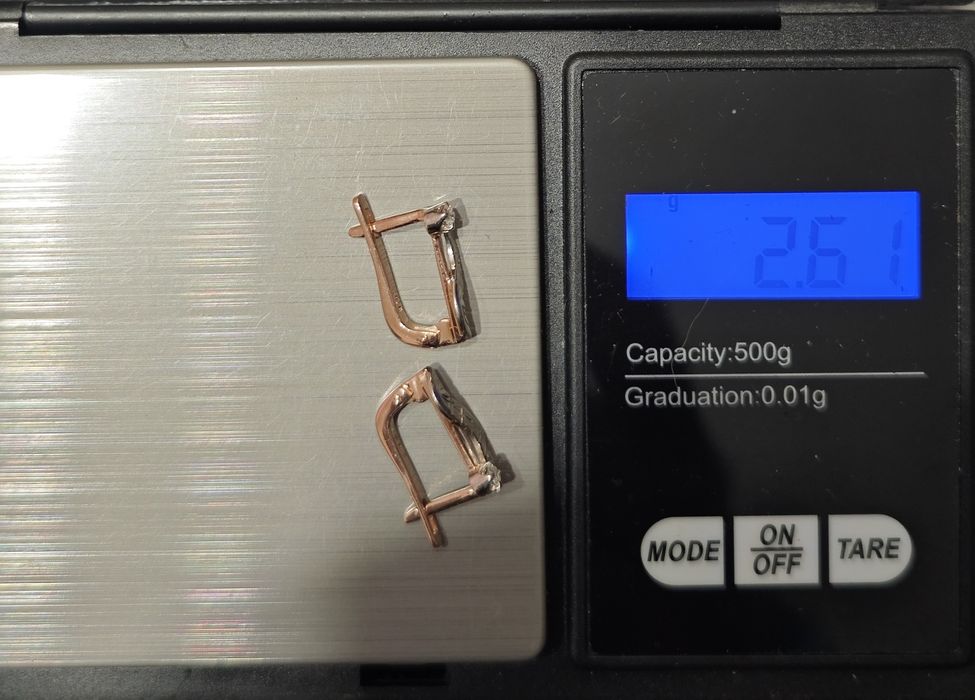 Золоті сережки з діамантами, 585 проба.