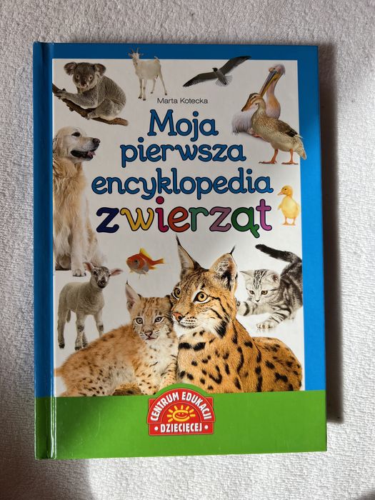 Encyklopedja zwierząt. Psy i szczenięta. Pierwszy Kotek