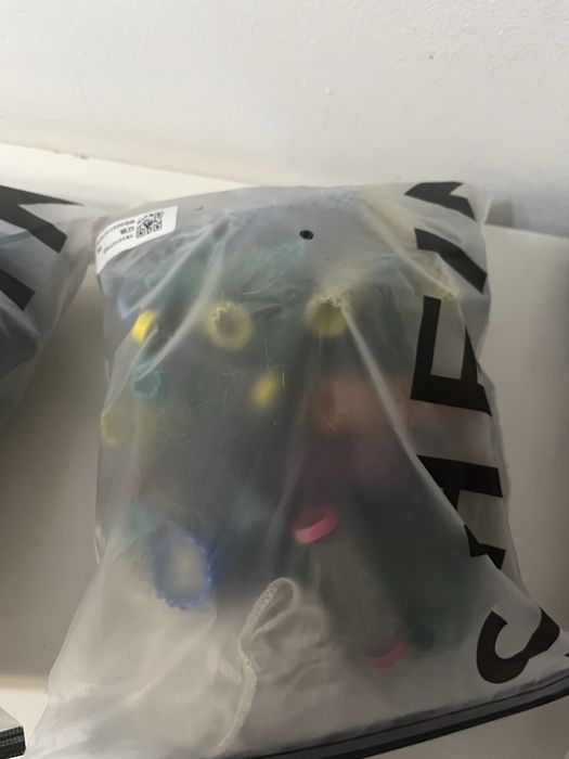 Vendo sacos com variedade de rolos para cabelo