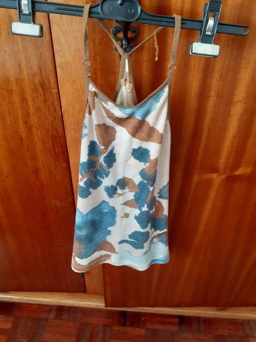 Roupa em óptimo estado de marca