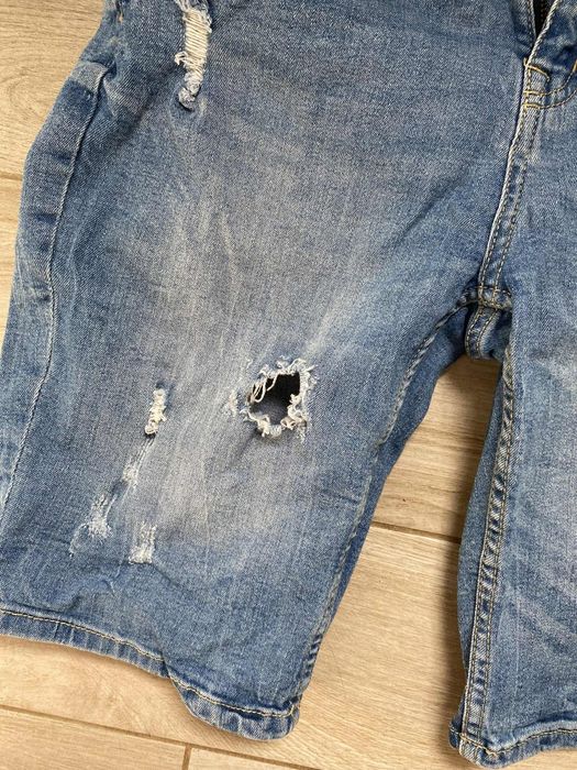 Spodenki jeansowe damskie niebieskie krótkie z dziurami