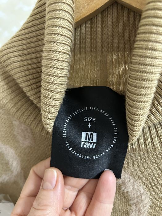 Продам теплий жіночий светр .Абсолютно новий ,ні разу не носився .