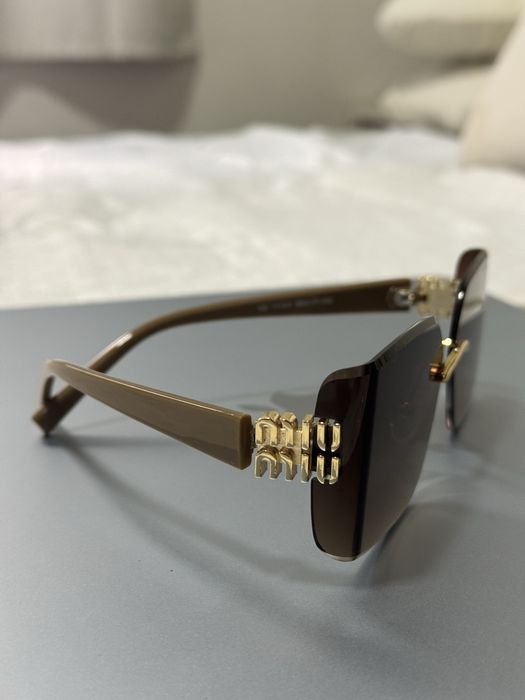 Óculos Miu Miu Castanhos - MODELO NOVO