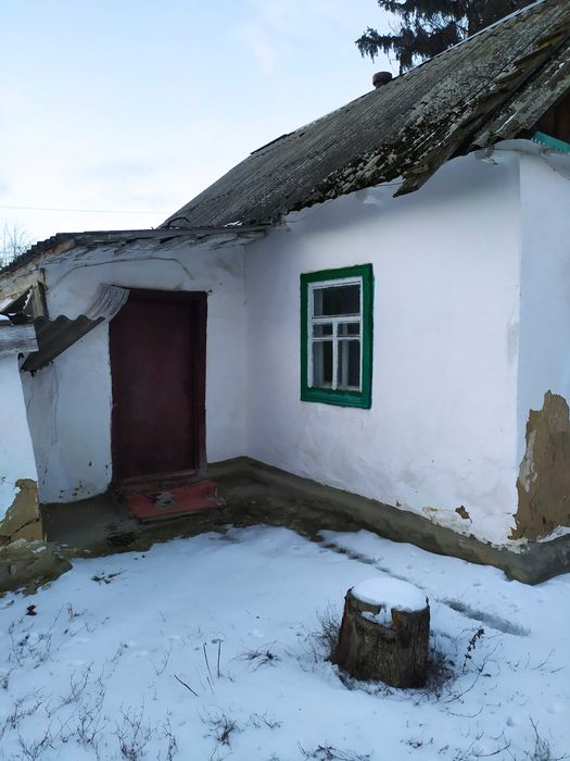 Хата в селі Росава