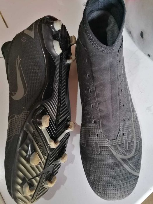 Chuteiras como novas.