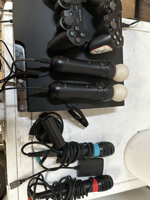 PlayStation 3 Slim Completa | 2 DualShock + 2 Move + SingStar