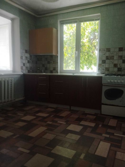 Продам 1/2 будинка район ХТЗ