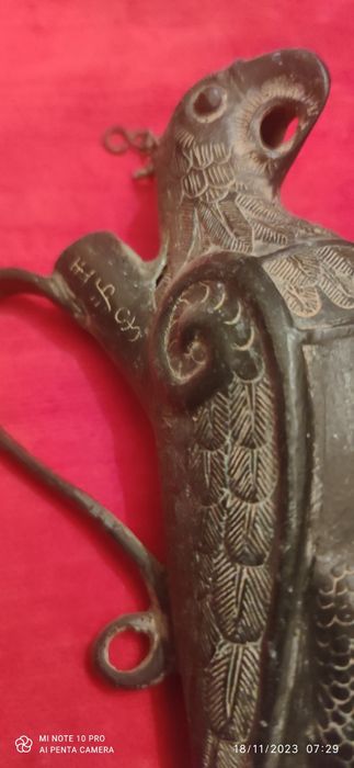 Pássaro antigo com marca Chinesa