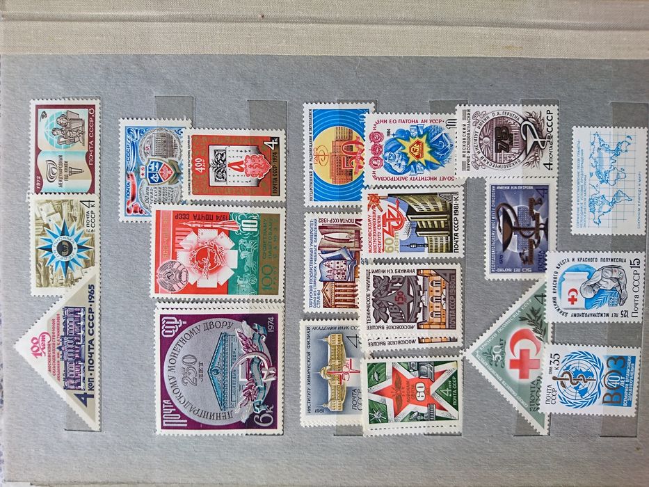 Альбом марок на тему олимпийские игры, космос, города, выставки.