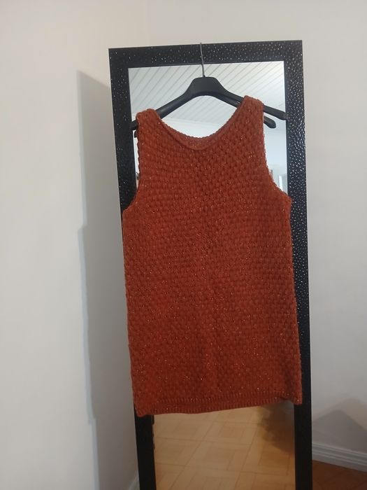 Colete ou poderá ser vestido