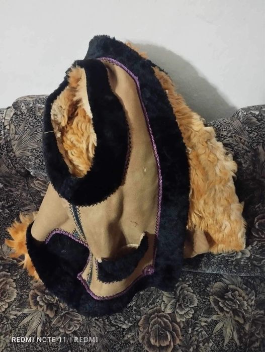 Кептар,кожуш та постоли.