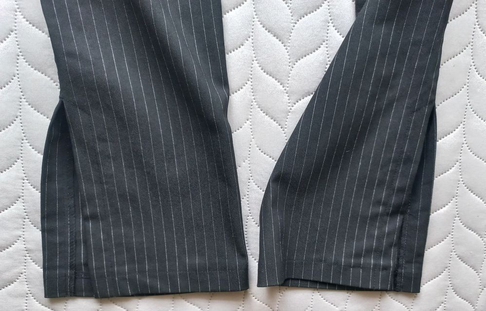 Spodnie bootcut z rozciętymi na dole nogawkami, 75% wiskozy