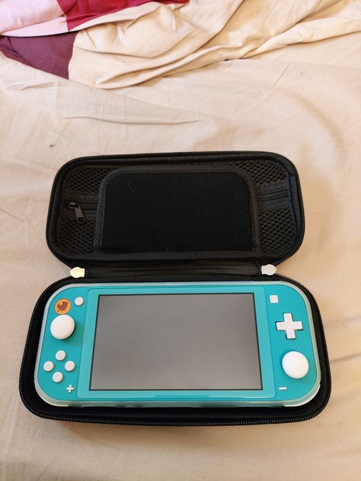 Nintendo Switch Lite, como nova e com extras