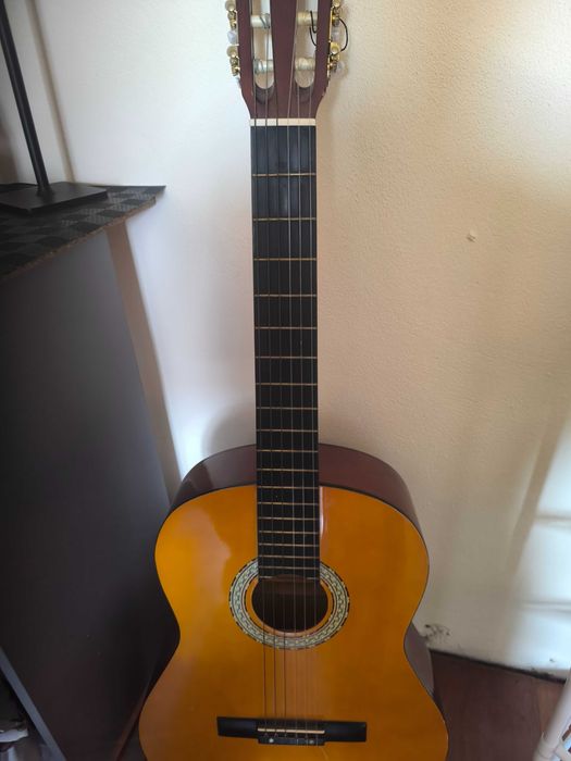 Guitarra como nova