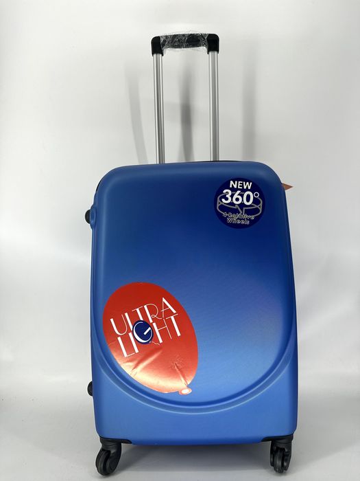 Nowa walizka średnia chabrowa, niebieska