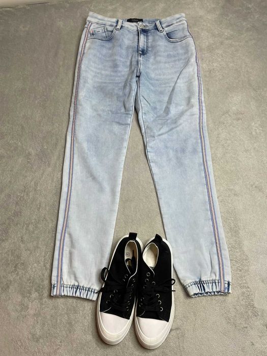 Jasne spodnie ściągacze na nogawkach Reserved 38 M