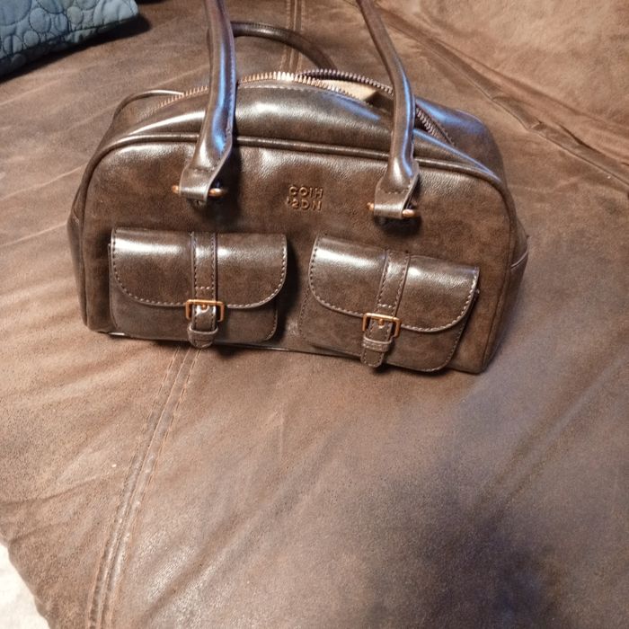 Продаю сумку шоколадного цвета.