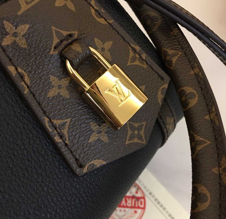 Шкіряна сумка Louis Vuitton Express LV