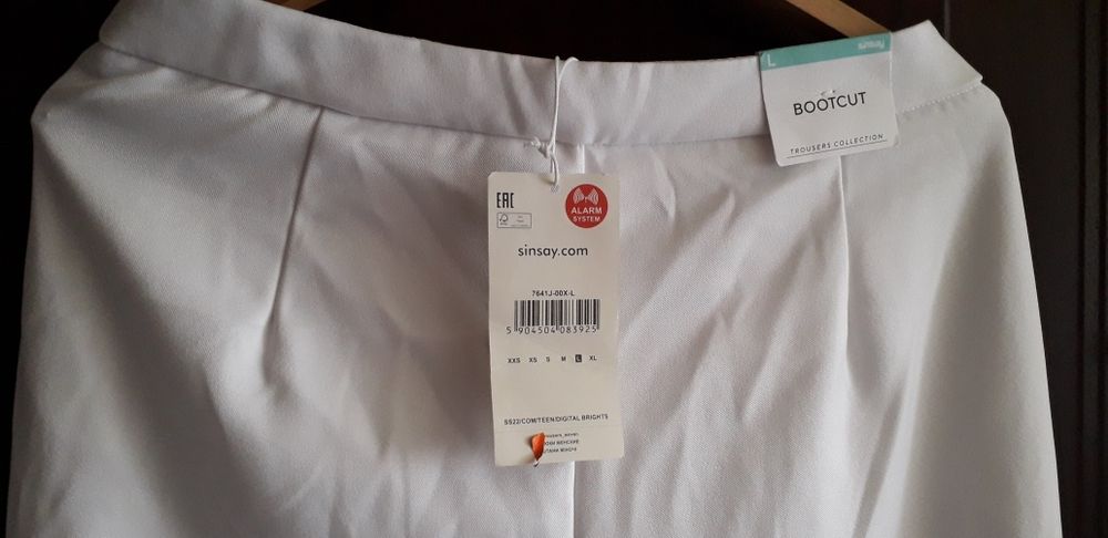 Białe eleganckie spodnie, r.L Sinsay. Nowe