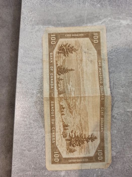 Продам 100 Канада.