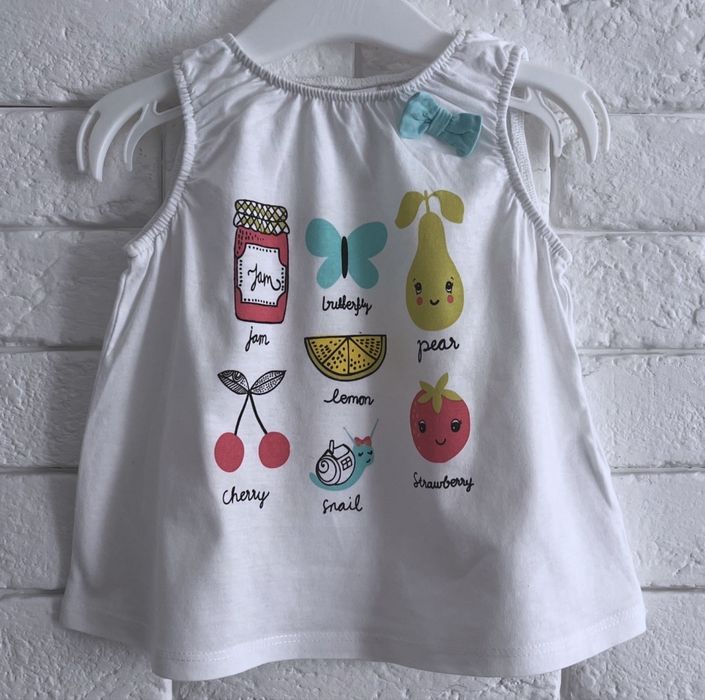 H&M 74cm bluzeczka na ramiączkach biała kokardka.