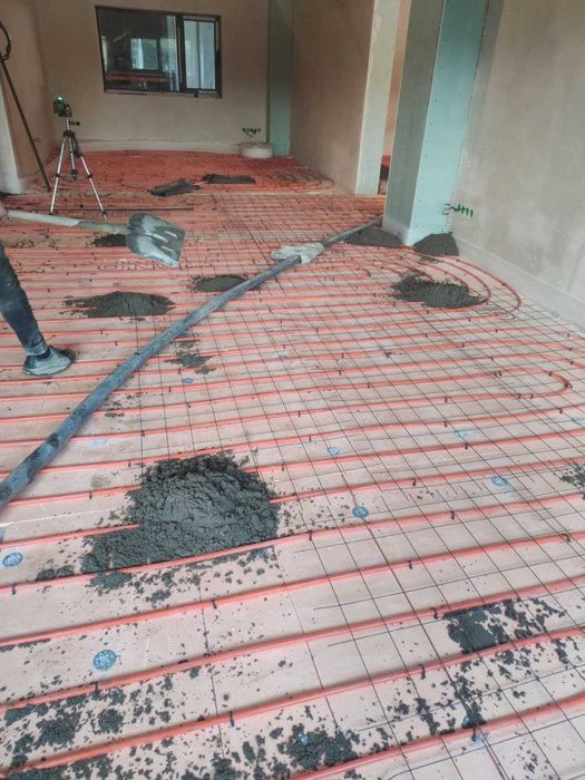 Машинная стяжка пола .