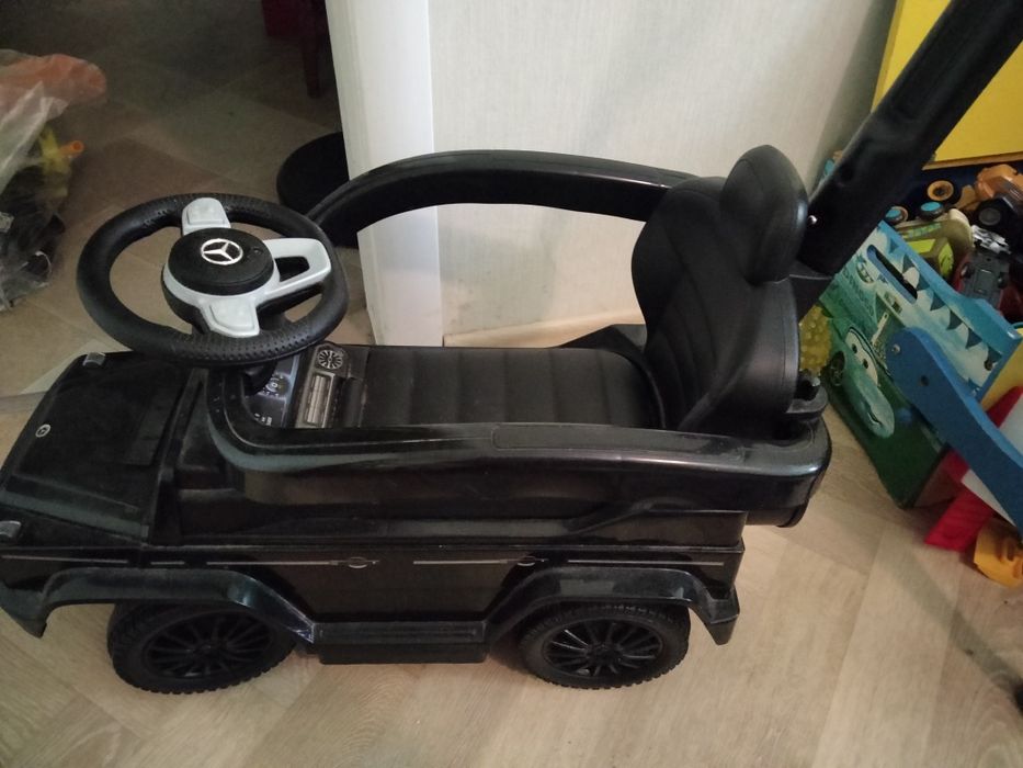 Толокар с родительской ручкой