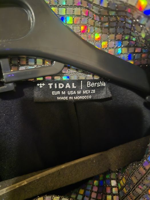 Casaco e um par de brincos