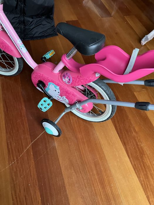 Bicicleta crianca rosa de aprendizagem