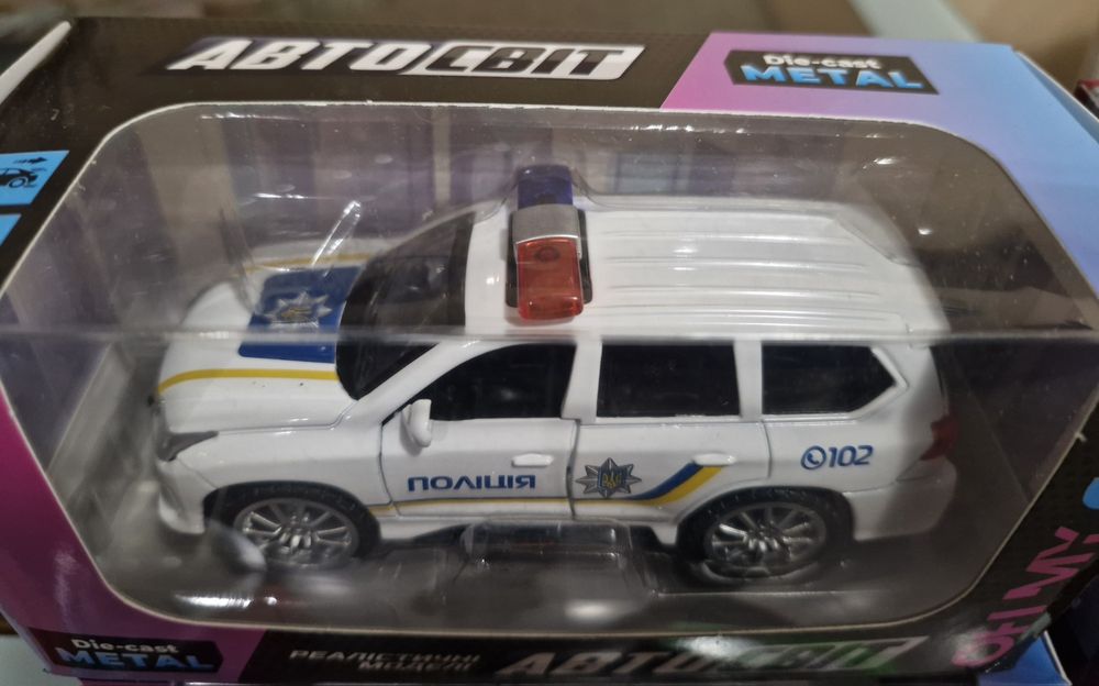 Металева модель Поліція Kinsmart,  Автосвіт, Nissan, пікап