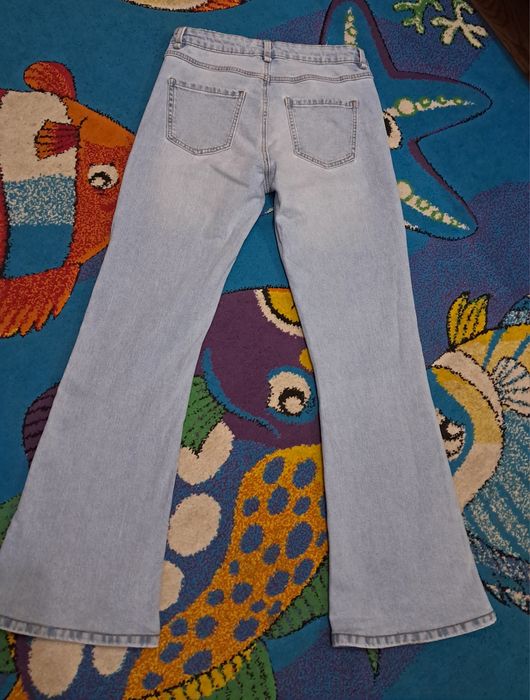 Jeansy Reserved dzwony roz.38 M/L