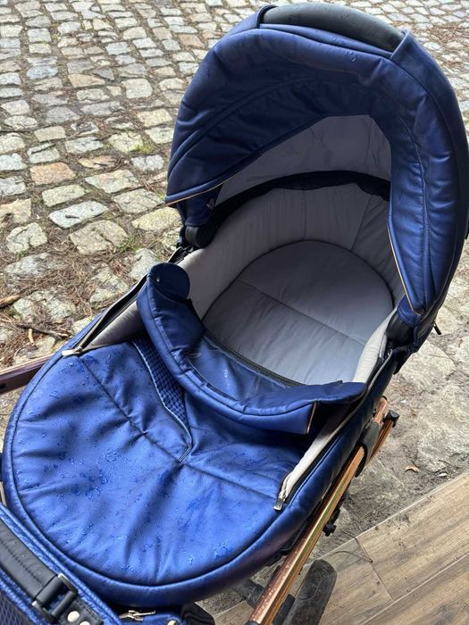 Wózek dziecięcy Junama dla dwójki dzieci w kolorze niebieskim