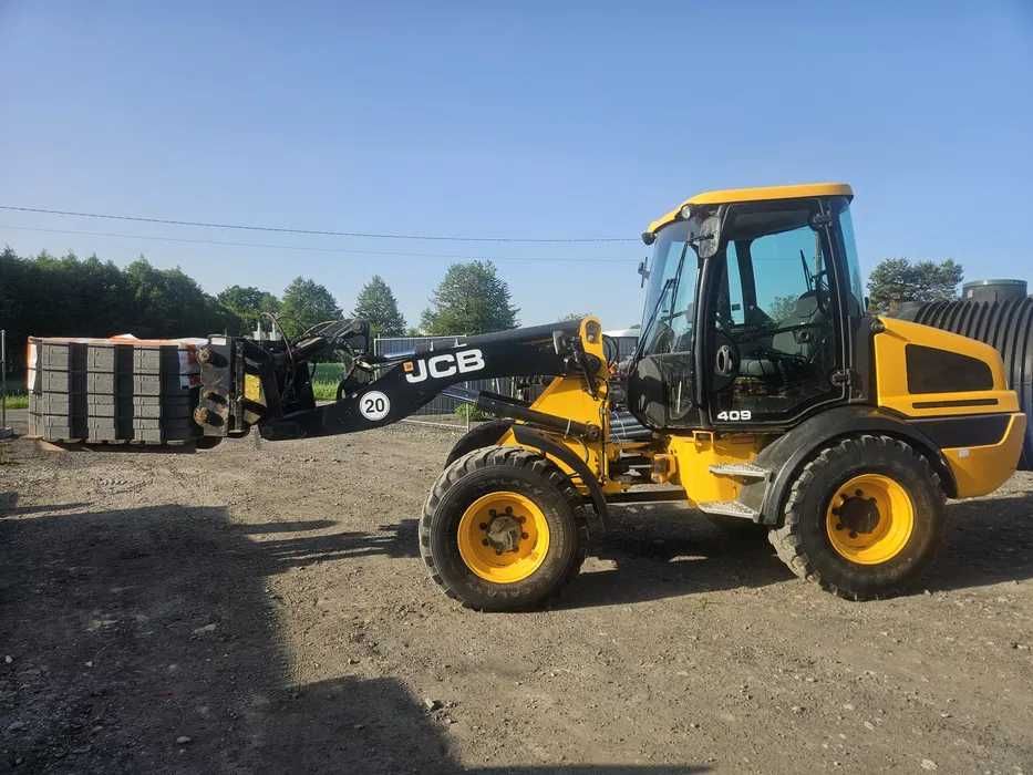 Ładowarka JCB409 wynajem maszyna kołowa