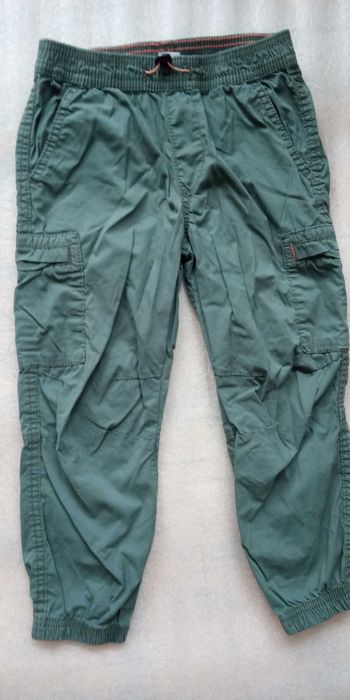 Spodnie H&M  przeciwdeszczowe rainwear chłopięce zielone rozmiar 110cm