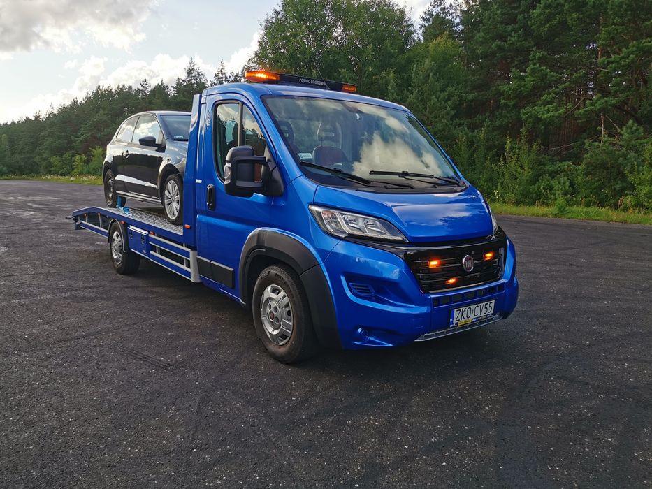 Pomoc Drogowa Laweta Holowanie Transport  Aut maszyn rolniczych