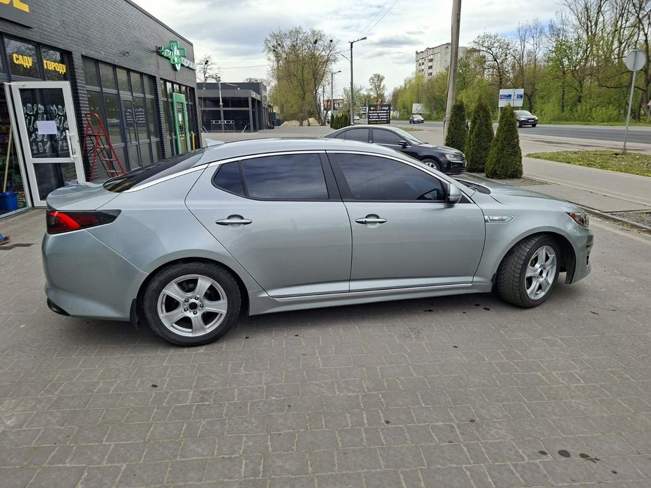 Киа оптима гібрид 2014