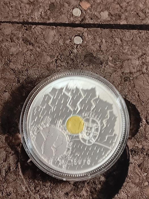 3 moedas prata prof de 5€ . O  Clima