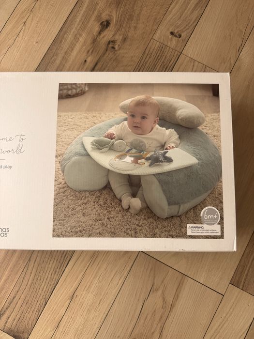 м’який підтримуючий крісло-сидіння для немовлят (Baby Support Seat), яке допомагає малюку сидіти та гратися.
