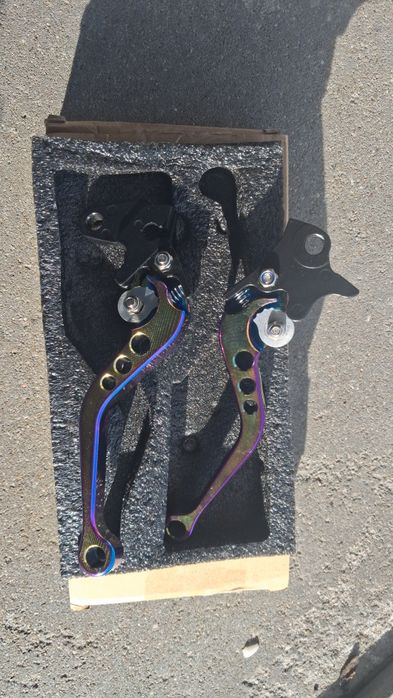 Klamki motocyklowe regulowane dzwignia