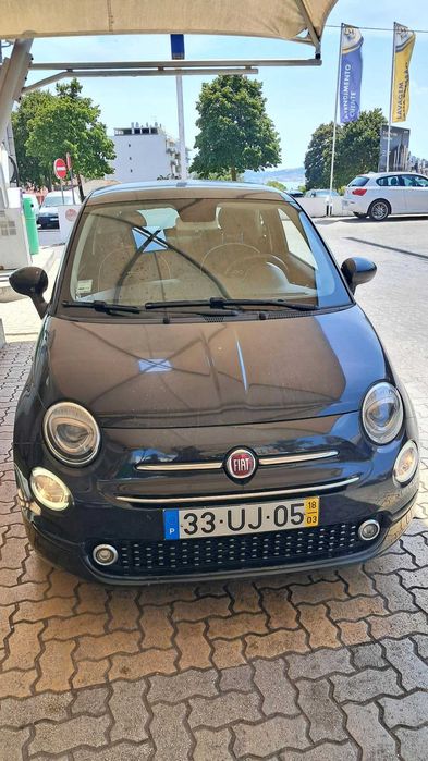 Fiat 500 preto com teto panoramico