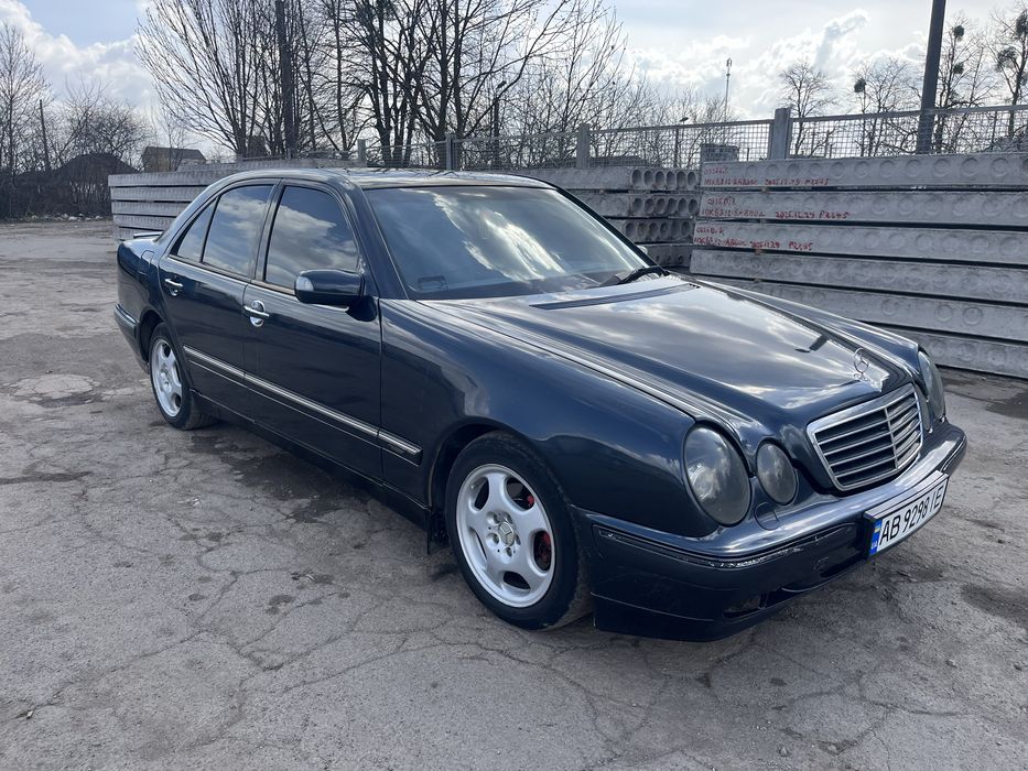 Мерседес Бенз 210