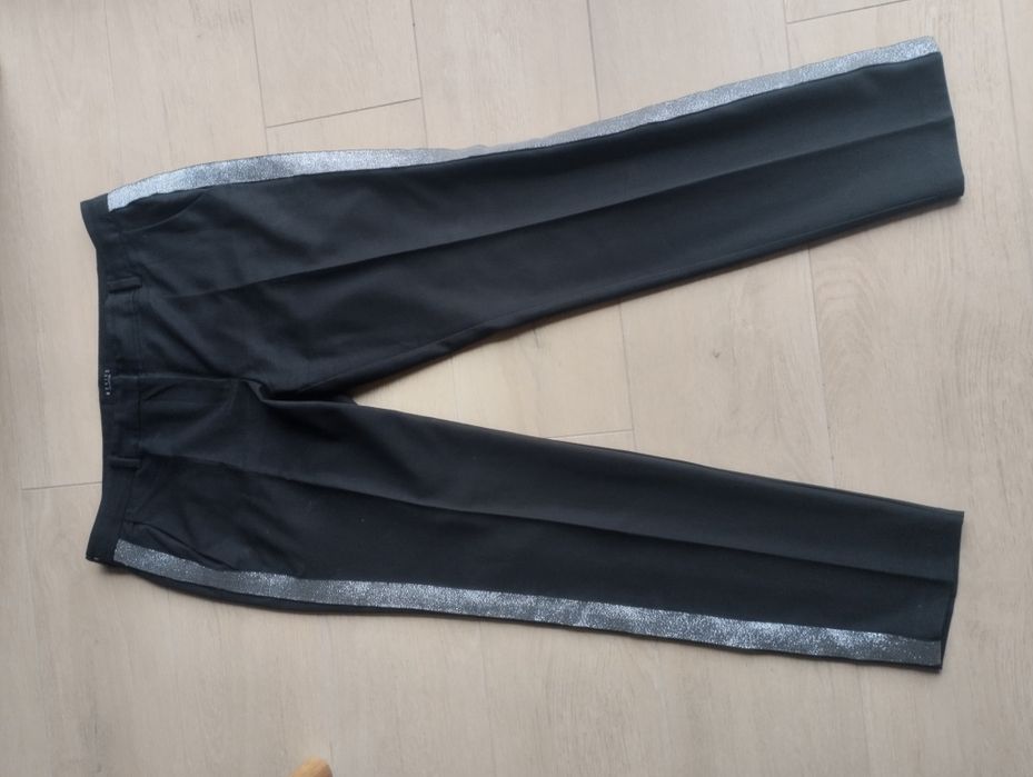 Mohito eleganckie czarne spodnie ze srebrnymi lampasami r. 42 L