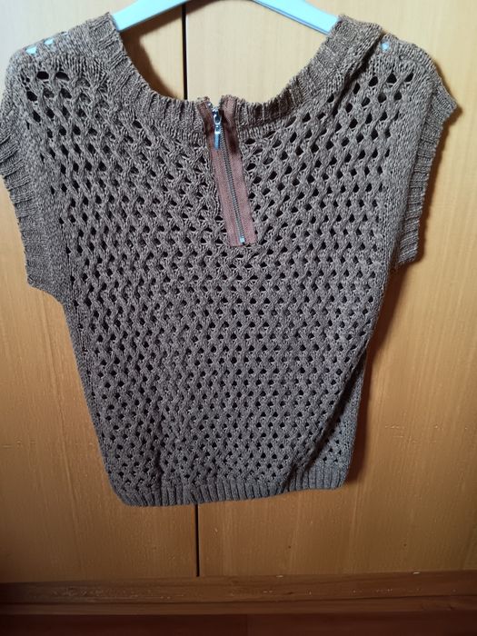 Blusa com fecho malha