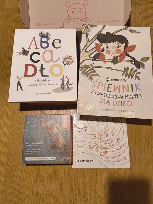 Nowy Pomelody box zestaw płyta CD, śpiewnik, karty edukacyjne, abecadł
