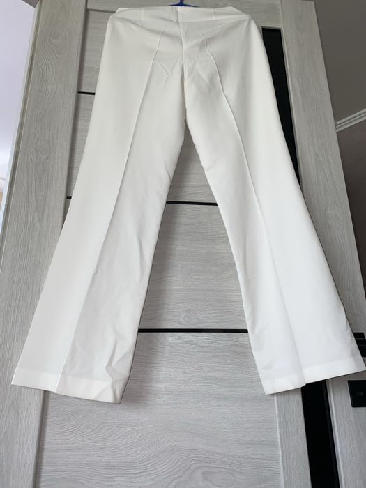Штани класичні білі кльош