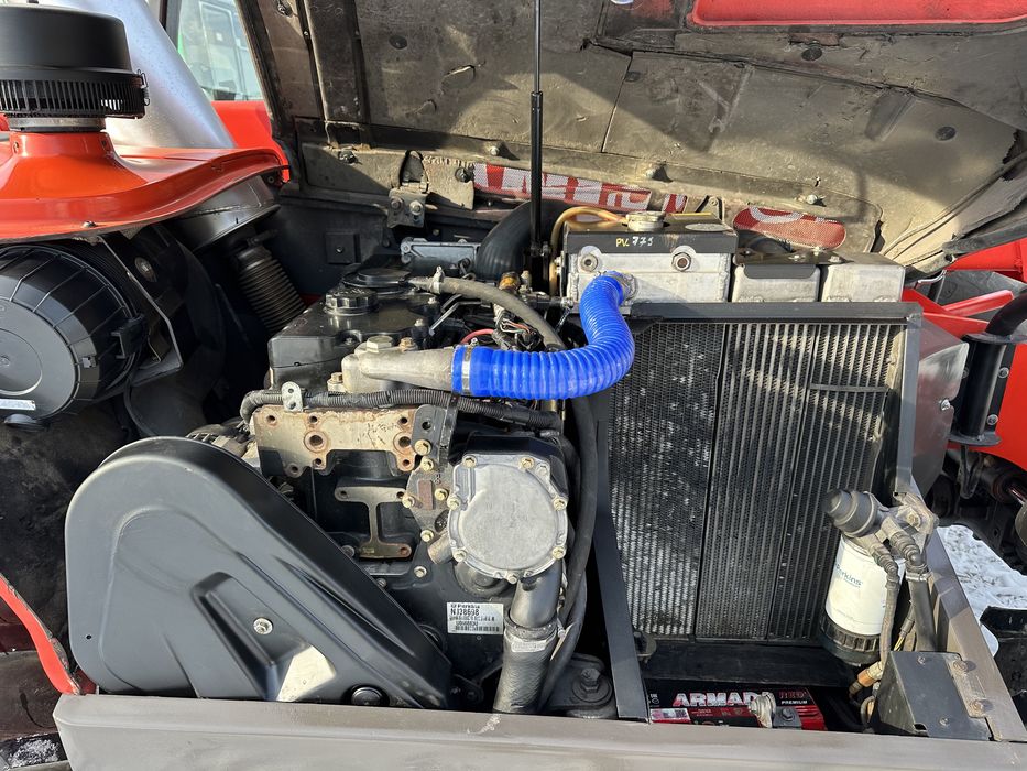 Телескопічний навантажувач маніту Manitou